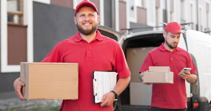 Moving companies in Newark NJ handling household relocation Top Jersey City moving company packing and transporting furniture Professional movers in NJ loading boxes into a moving truck