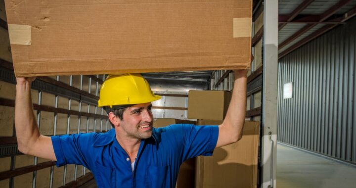 Best moving companies in NJ packing and loading boxes Top Jersey City moving company handling residential moves Professional movers relocating furniture in New Jersey