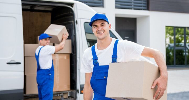 Experienced team of top Jersey City movers providing professional moving service in New Jersey, loading furniture into a truck