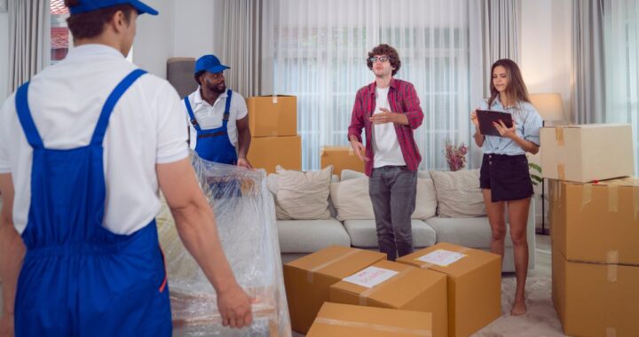 Movers NJ from a top Jersey City moving company loading a large sofa”