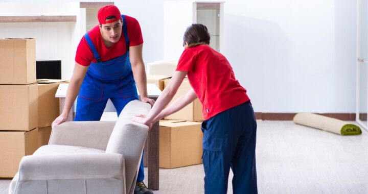 Newark NJ movers wrapping furniture, part of Top Jersey City moving company service.